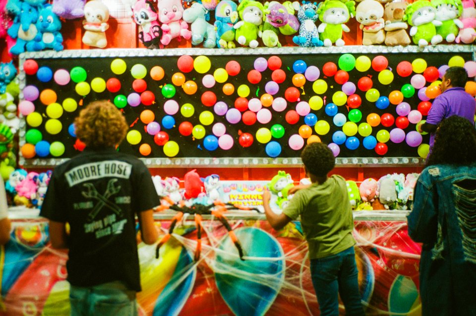 Balloon dart wall at the SKVLKFest carnival
